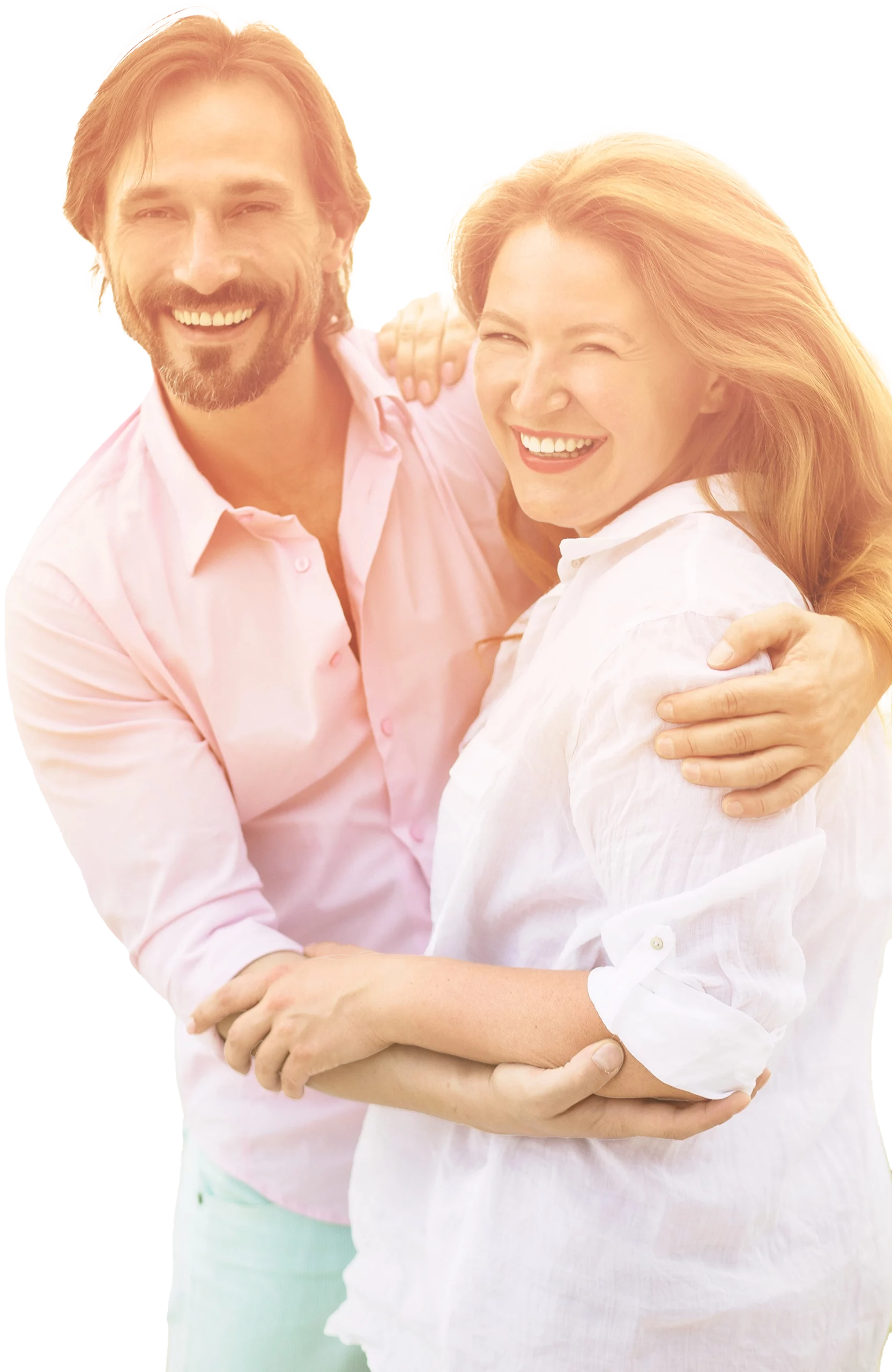 Couple smiling in warm embrace